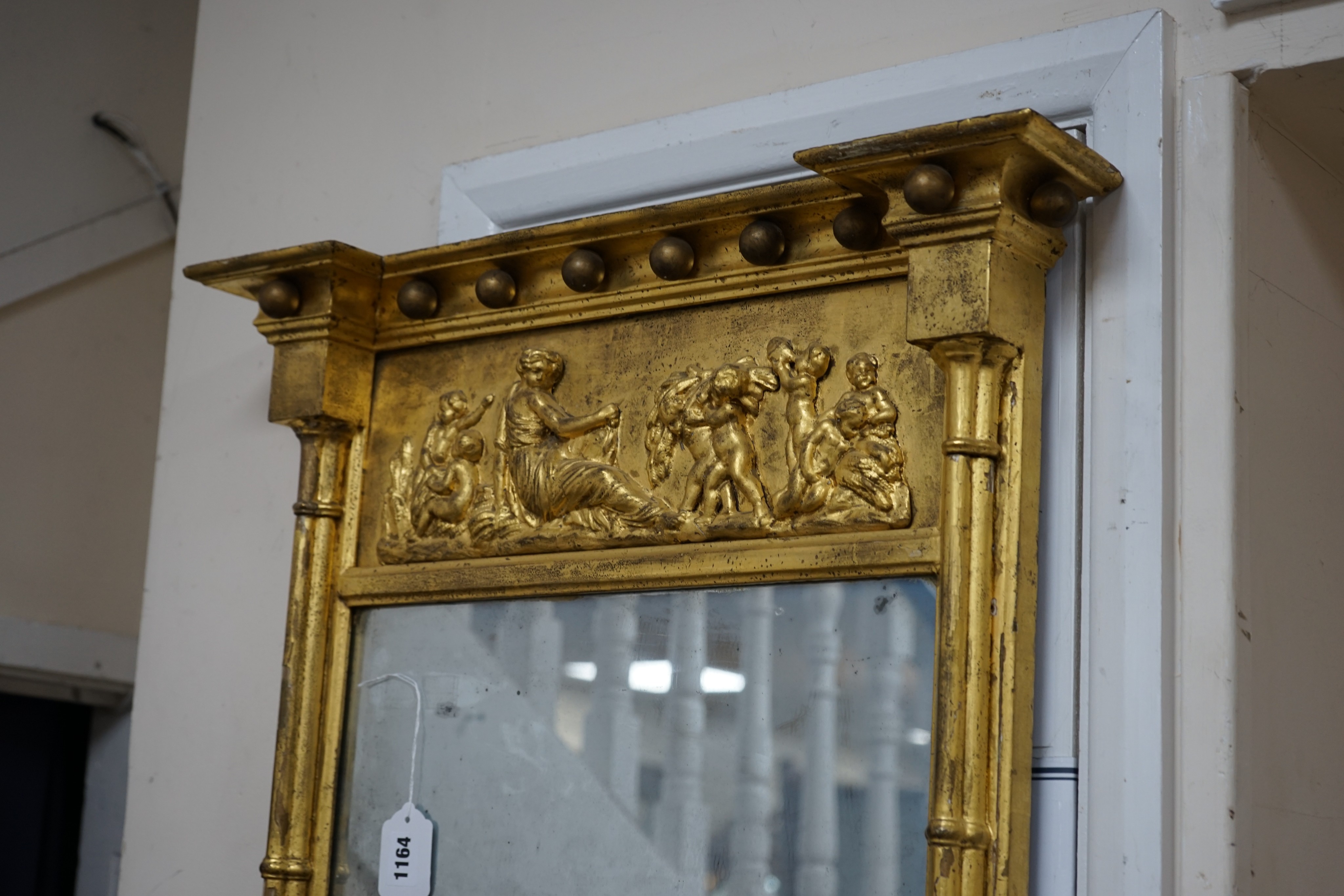 A Regency giltwood and gesso pier glass, width 60cm, height 99cm